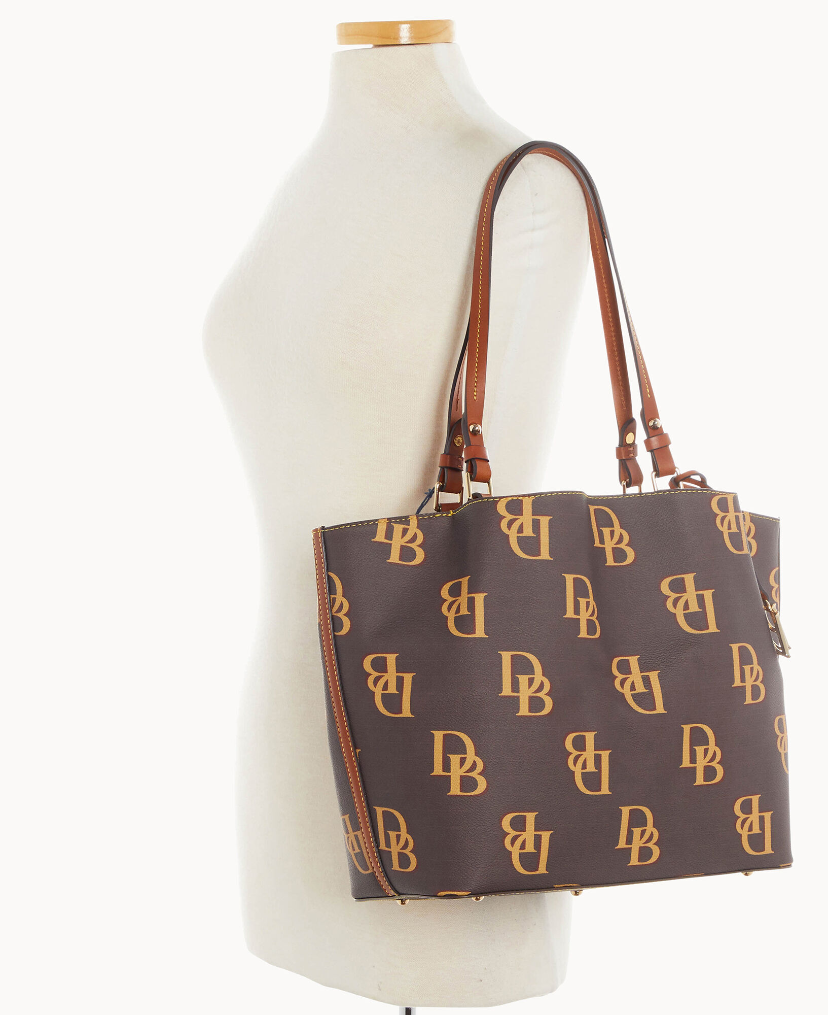 Dooney & Bourke Handbag, Monogram Crossbody Bucket - Brown Tmoro: Handbags